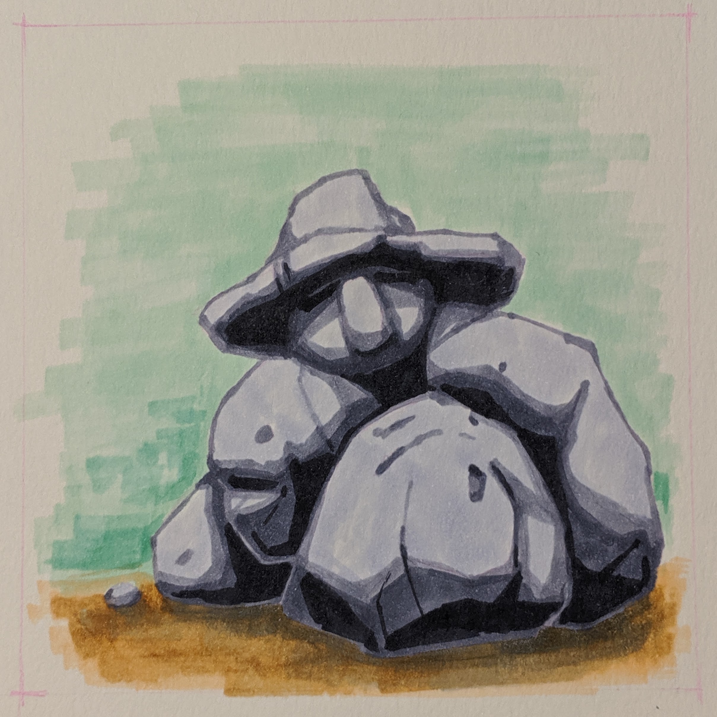 A pile of rocks with a witch face