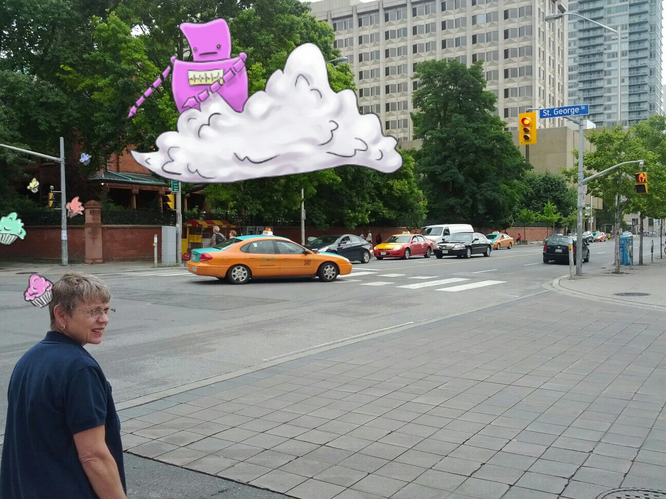 A DoodleCam photo with a robot in a cloud throwing cupcakes at a pedestrian