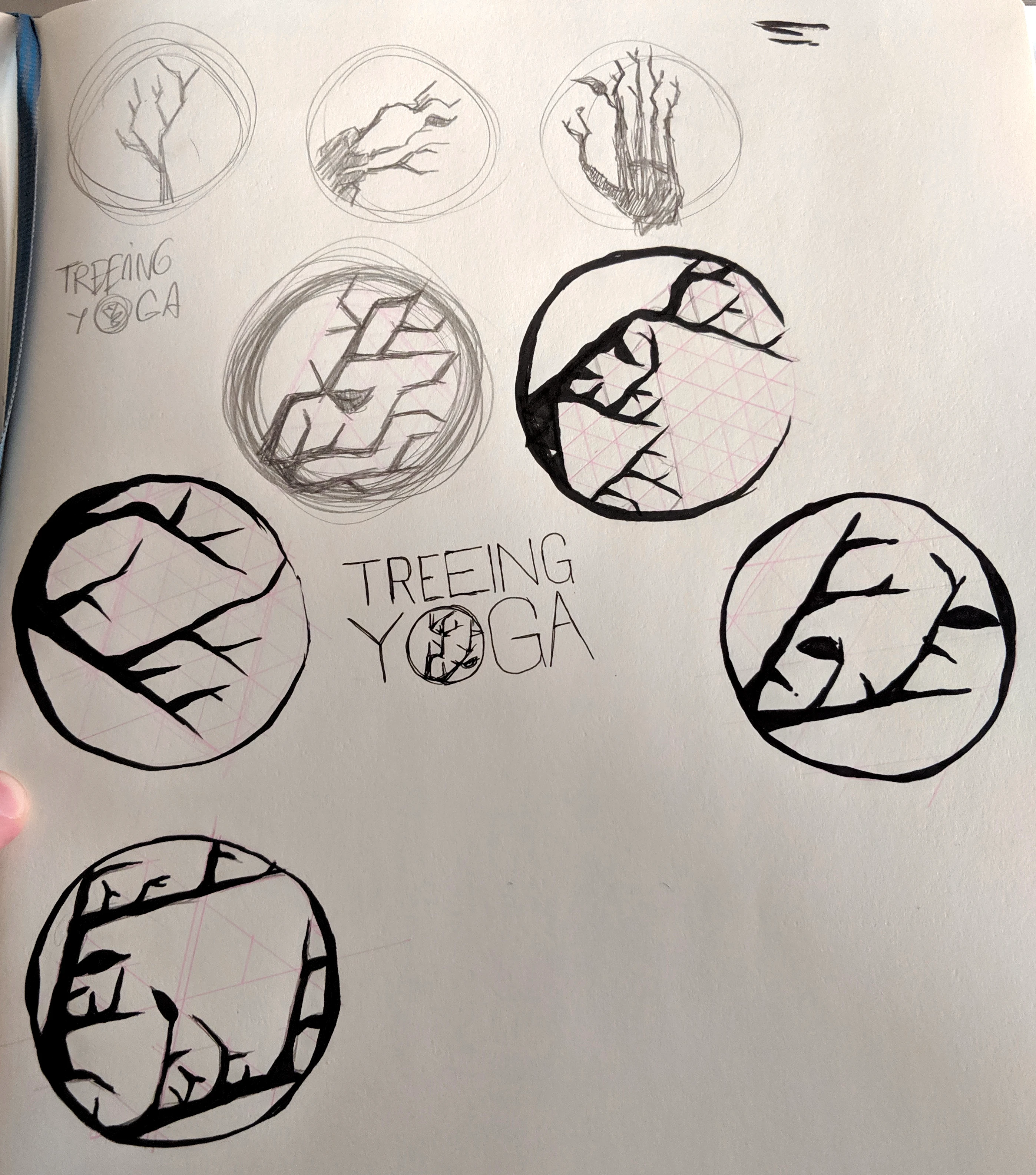 A sketchbook page with Treeing Yoga logos using a triangular fractal grid in a circle